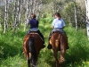 My niece and nephew on a trail ride